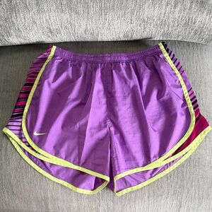 Nike Women's Purple Athletic Shorts with Neon Yellow/Green Trim
